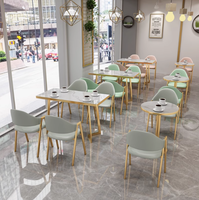 Ensemble de meubles de restaurant occidental minimaliste de haute qualité chaises de table à manger en cuir doré à cadre en métal moderne pour café
