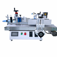 Machine d'étiquetage automatique de bouteilles cosmétiques pour shampooings, lotions, crèmes et produits de soin de la peau