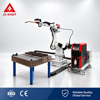 Table de soudage flexible robuste, poste de travail de soudage robotisé pour la fabrication d'amortisseurs automobiles