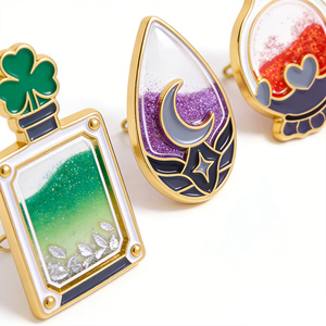 Nouveauté : Épingles en métal avec paillettes de sable <span class=keywords><strong>liquide</strong></span>, épingles en émail personnalisées en forme de trèfle, épingles à revers avec sable <span class=keywords><strong>liquide</strong></span>, bouteille pour sac, vente en gros - Product Image 2