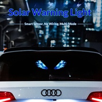 Lampe LED 2W rechargeable sans fil à énergie solaire, transfrontalière, avec fonction d'avertissement et décorative, à ventouse pour camion, effet œil de démon