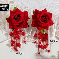 Pendientes de tela bohemios con diseño de borla de flores tridimensional colorida para ocasiones festivas y bodas de mujeres