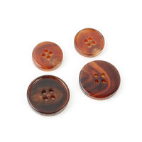 Boutons plats en corne de buffle véritable à 4 trous pour l'automne et l'hiver, écologiques et lavables en machine, pour accessoires vestimentaires (vente en gros)