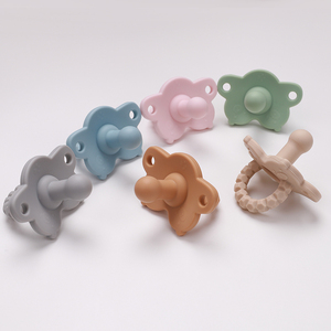 Venta al por mayor cara sonriente forma seguridad suave grado alimenticio silicona bebé chupete de pecho como chupete - Product Image 5