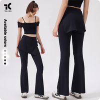Ensemble de pantalon de yoga évasé à taille haute, avec effet seconde peau, devant uni, maille respirante en dentelle, bonnets intégrés et ourlet amovible style tablier