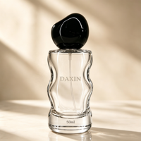 Flacon de parfum en verre cylindrique de luxe exclusif de 50 ml, design de contour unique, vaporisateur à pompe, flacon de parfum en verre