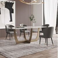 Nouveaux meubles de salle à manger de luxe italiens en acier inoxydable ensemble de table à manger à jambes en or rectangulaire marbre 8 places dessus de salle à manger en pierre