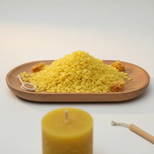 <span class=keywords><strong>Cire</strong></span> <span class=keywords><strong>d</strong></span>'<span class=keywords><strong>abeille</strong></span> brute <span class=keywords><strong>de</strong></span> luxe personnalisée en usine, 25 kg/sacs, granulés <span class=keywords><strong>de</strong></span> haute qualité, écologiques, sans fumée, marque HuDong, Zhejiang, 100 % pour bougies - Product Image 1