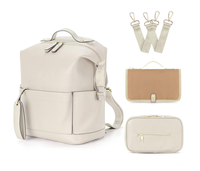 Sac à dos pour couches, sacs à couches en cuir imperméables avec station de change pour bébé, sac à dos de voyage tendance pour maman et papa