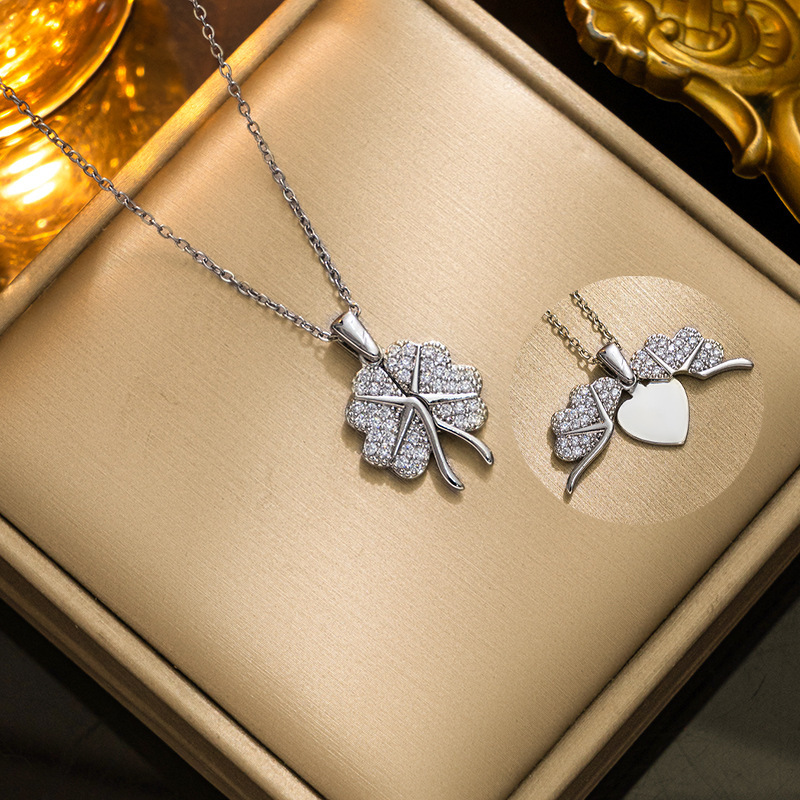 gold opening closing four-leaf clover