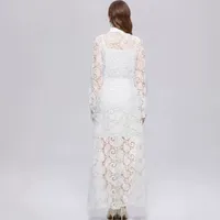 Robe élégante à manches longues avec col montant en polyester uni pour les occasions estivales, disponible en jaune, noir et blanc
