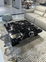 Table basse moderne en marbre naturel avec structure en acier inoxydable, design durable, style luxe léger pour villas, appartements et salons