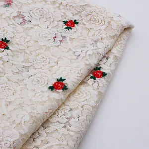 Tissu en maille de soie de lait doux de haute qualité avec broderie en dentelle et motif de rose durable pour les vêtements pour femmes Textiles de maison