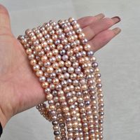 Nouveau produit Perles rondes naturelles couleur bonbon 40cm 7-8mm Perles d'eau douce sans noyau Matériel de collier semi-finis DIY Vente en gros