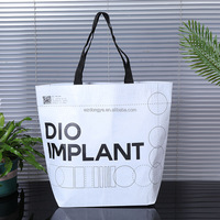 Ouye Vente en gros Sacs fourre-tout à provisions pliables tissés en PP écologiques Impression de logo personnalisé pour les cadeaux