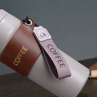Mug isotherme à double paroi en acier inoxydable 18/8 de 17 oz avec logo personnalisé Emerit 2026 et sangle de transport pour la vente en gros