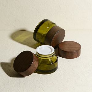 Unique Shape 15g 30g 50g Amber Olive Green Slant Shoulder Cosmetic Cream <b>Jar</b> Wide Mouth <b>Glass</b> <b>Jar</b> <b>with</b> <b>Wood</b> Screw <b>Lid</b> - Product Image 1