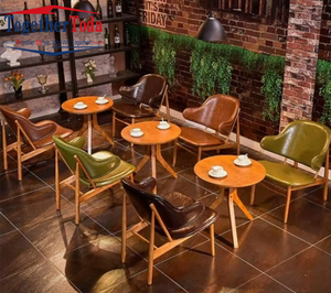 ชุดเฟอร์นิเจอร์ร้านอาหารสมัยใหม่ ชุดเก้าอี้และโต๊ะรับประทานอาหารหนังและไม้สำหรับร้านกาแฟ โต๊ะและเก้าอี้ร้านอาหารคาเฟ่ - Product Image 1
