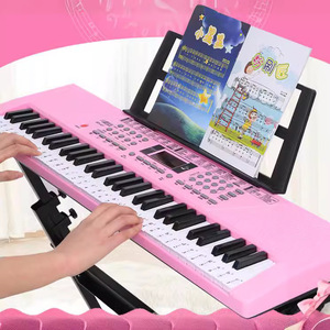 Clavier électronique à 61 touches pour enfants, jouet éducatif, instrument de musique avec support musical et livre de chansons, couleur rose - Product Image 1