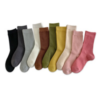 Chaussettes mi-mollet pour femmes en couleur bonbon, polyvalentes pour l'automne et l'hiver, chaussettes longues tendance à rayures verticales de couleur unie