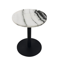 Table à manger ronde en marbre avec base en fer noir