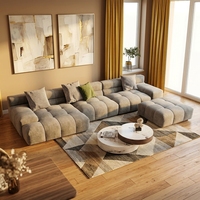 Canapé moderne italien minimaliste en tissu technique mat, design bloc de tofu, idéal pour les petits espaces et les salons
