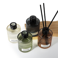 Elegan mewah 150ml 200ml bulat vertikal garis kosong Aroma Reed Diffuser botol kaca dengan warna kustom