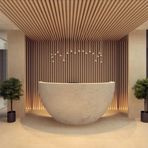 Escritorio de recepción redondo a medida, mostrador de recepción de superficie sólida de Corian duradero para Hotel - Product Image 1