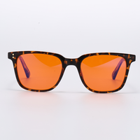 Lunettes de vue tendance en gros d'usine, légères, avec filtre anti-lumière bleue à 99 %, design riveté, verres carrés rouge-orange
