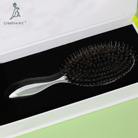 Brosse à cheveux en gros d'usine, personnalisée, pour extensions, avec coussin d'air et poils de sanglier, finition argentée électrolytique