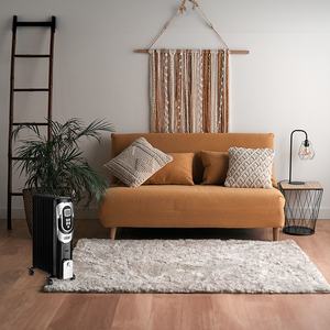 Radiatore a olio 2000W, 9 elementi, nero/argento, con termostato, timer, ruote e luce indicatrice, ideale per riscaldare - Product Image 1