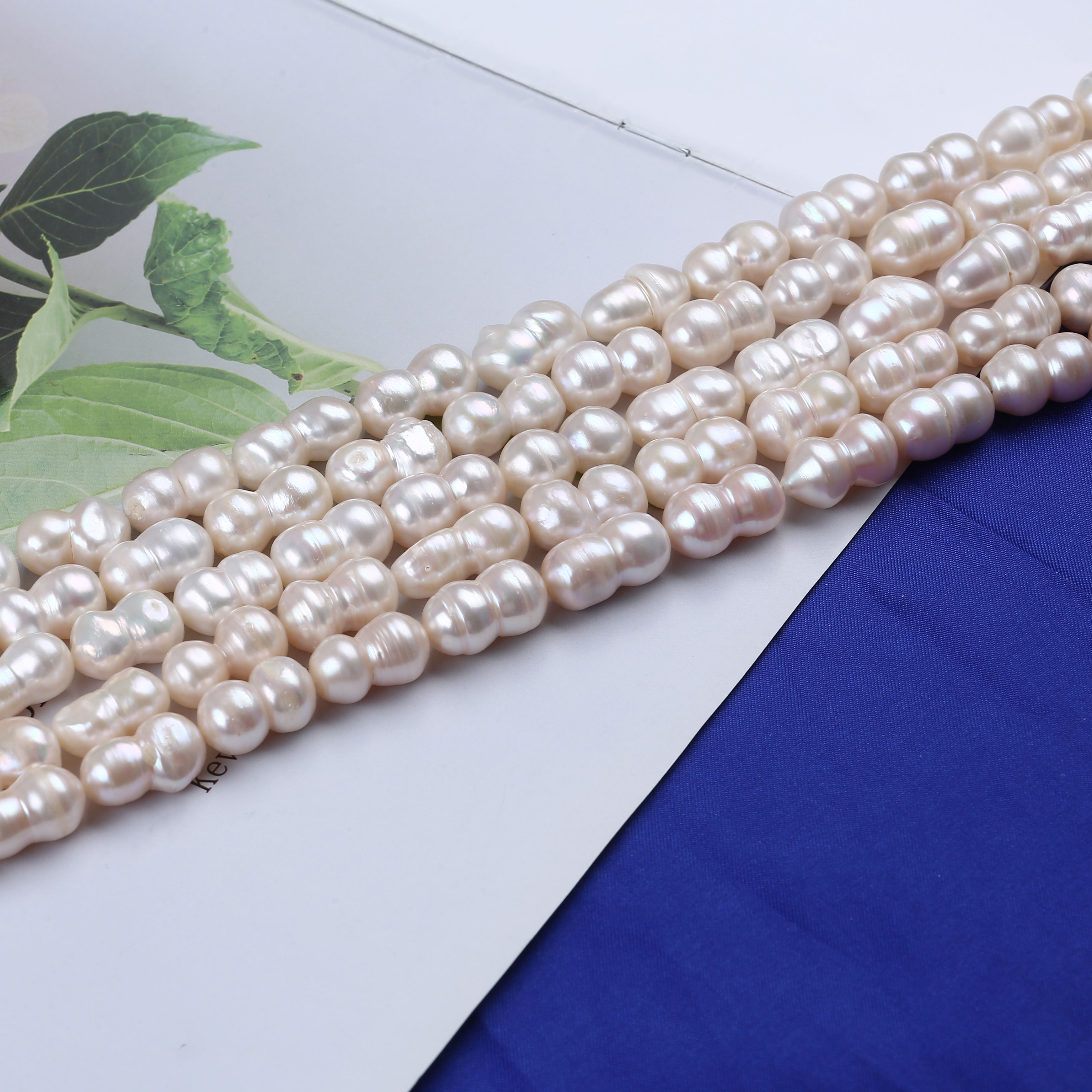 ひょうたん形ホワイトバロックパールビーズストランド淡水バロック