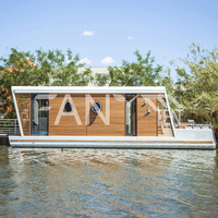 Fanye Maison flottante moderne modulaire en aluminium gonflable pour fête de famille, yacht de loisirs, ponton, bateau de plaisance aquatique