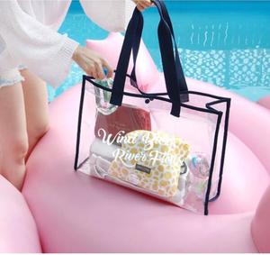 กระเป๋าโท้ทฤดูร้อน PVC ใส ดีไซน์โปร่งใส จุของได้เยอะ พร้อมหูหิ้วริบบิ้นและตัวล็อคแบบสแนป สำหรับไปเที่ยวทะเล ออกกำลังกาย - Product Image 1