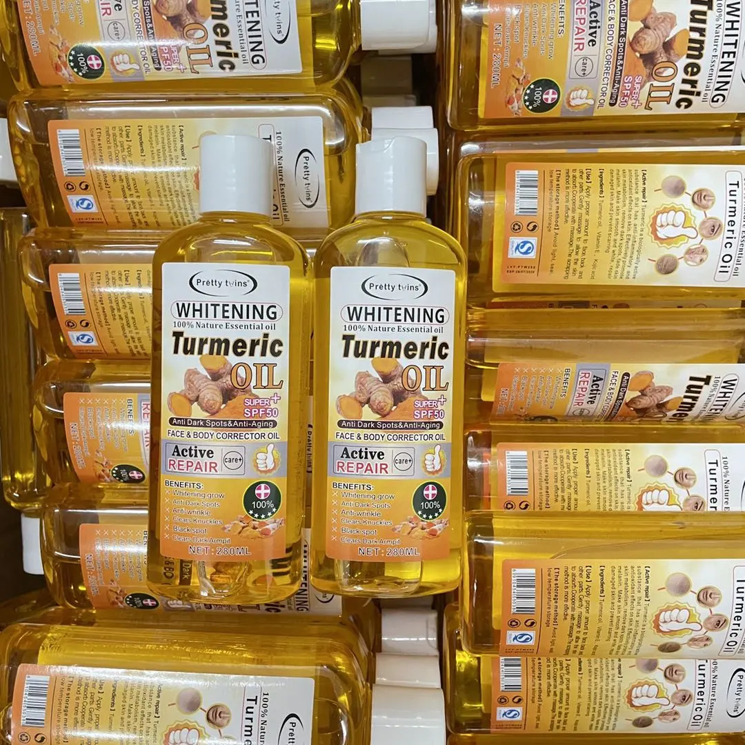 En kaliteli sıcak satmak cilt aydınlatma için tumeric yağı 280ml altın sarı renk beyazlatma afrika koyu cilt dizler knuckle ağartma