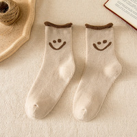 Vente en gros Terry Solide Couleur Curling Femmes Chaussettes Personnalisé Épais Chaud Sourire Sourire Visage Chaussettes