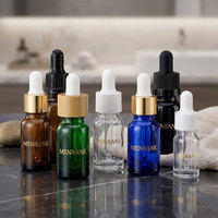 Flacon en verre de luxe vert anti-UV avec boîte, flacon compte-gouttes avec bouchon CR, flacon roll-on, fournisseur d'emballages personnalisés avec logo
