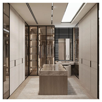 Dressing sur mesure haut de gamme avec îlot central et armoire de rangement premium à tiroirs à fermeture amortie