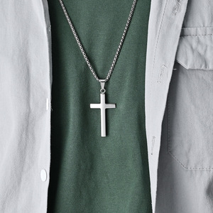 This unisex <b>titanium</b> steel cross necklace features a unique geometric design and a colorfast cross pendant. - Product Image 3