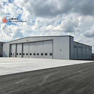 <span class=keywords><strong>Hangar</strong></span> d'avion modulaire <span class=keywords><strong>démontable</strong></span> en acier, structure réutilisable, porte personnalisée, isolation thermique pour tous les systèmes d'assistance à l'aviation - Product Image 2