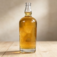 Bouteille en verre vide transparente de qualité alimentaire de luxe de 500 à 750 ml avec un bon système d'étanchéité, gravure personnalisée, bouteille en verre pour whisky, vodka, gin