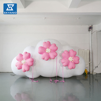 Modèle de nuage de fleurs rose gonflable personnalisé pour la décoration d'événements en plein air ou les activités de mariage sur la pelouse