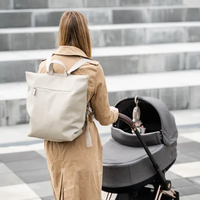 Vente en gros logo personnalisé grand sac à couches pliable pour bébé voyage pour maman sac à couches imperméable de luxe sac à dos avec station à langer