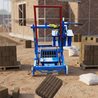 Mini machine manuelle à pression pour la fabrication de blocs de pavé, de briques et de parpaings en ciment, sable et cendres