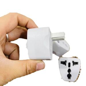 Adaptador de enchufe, adaptador de dos a tres clavijas, enchufe al por mayor para tiendas de un dólar, enchufe doméstico multifuncional. - Product Image 1
