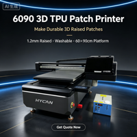 6090 3D TPU UV vlakbedprinter met 4 printkoppen voor 1,2 mm gestructureerde patches op jersey hoodies, sweatshirts, wasbare UV vlakbedprinter