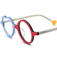 Nouvelles montures de lunettes en plastique givré multicolores en forme de cœur pour femmes, avec un design original.
