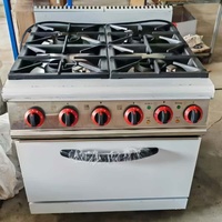 Cuisinière à gaz commerciale de luxe en acier inoxydable, 4 brûleurs, grilles en fonte robustes, four intégré