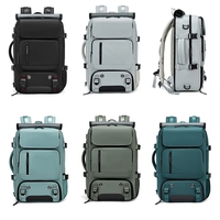 Nouveau sac à dos de voyage de grande capacité à logo personnalisé avec intercalaire pour ordinateur portable de 16 pouces en polyester Port de charge USB mâle