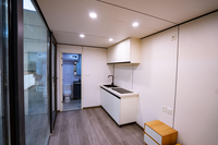 Maison préfabriquée en capsule Apple de Chine Mobile, mini-maison préfabriquée à faible coût, cabine préfabriquée moderne de 20 pieds, petite maison conteneur